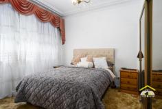  13 St Pauls Cres Liverpool NSW 2170 $890,000 - $940,000 First time offered for sale is this property on a large rectangular block of land. The home consists of: - 3 bedrooms with one built in wardrobe - Separate air conditioned lounge room - Upgraded bathroom - Renovated kitchen with meals area - Covered rear verandah with laundry - Lockable side carport - Covered BBQ/Pergola area - Garage converted to lounge, kitchen, bedroom, bathroom This property is zoned R3 Medium Density Residential, sits on a large 695sqm block of land with a 16.9m frontage and is well located to shops, schools and transport.  