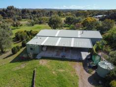  223 Dunkley Circuit Pink Lake WA 6450 $450,000 Abundant wildlife surrounds this Rural Residential 3.33Ha lot just 12km from Esperance CBD. The tree lined approach reveals a massive 25m x 12m Colorbond shed with approved 11m x 12m living quarters which includes kitchen, bathroom, bedroom, living area and mezzanine level with office and storage. 3 bay undercover storage with pit and high clearance roller doors leading into shed. Approx 34,000L rainwater storage with bore backup. 