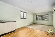  13 St Pauls Cres Liverpool NSW 2170 $890,000 - $940,000 First time offered for sale is this property on a large rectangular block of land. The home consists of: - 3 bedrooms with one built in wardrobe - Separate air conditioned lounge room - Upgraded bathroom - Renovated kitchen with meals area - Covered rear verandah with laundry - Lockable side carport - Covered BBQ/Pergola area - Garage converted to lounge, kitchen, bedroom, bathroom This property is zoned R3 Medium Density Residential, sits on a large 695sqm block of land with a 16.9m frontage and is well located to shops, schools and transport.  