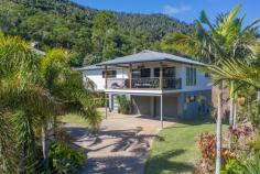  13 Amarula Place Cannonvale QLD 4802 $839,000 This modern family home is located in the heart of Cannonvale's most popular neighbourhoods, with all the privacy and tranquility needed to bring up the little ones. Situated just 10 minutes away from the exciting buzz of Airlie Beach this property is definitely for those seeking the Whitsunday's lifestyle. The contemporary abode itself boasts four bedrooms and three bathrooms on the spacious 823m² lot, fit with a large open-plan modern kitchen and cosy living area backing onto the vast timber deck creating a vibrant indoor/outdoor living experience in the costal breeze. What better way to kick back after a long day at work than a glass of wine overlooking the foliage of the Whitsunday mountains? The kitchen has been designed to the modern-day spec; with a gas cooktop, electric oven and dishwasher installed, combined with the expansive kitchen bench that can be used as a breakfast bar for busy mornings or entertaining guests in the evenings. All bedrooms come with air-conditioning units and built-in wardrobes, whilst the master-suite has its own walk-in wardrobe and ensuite, allowing comfort in the summer heat and seamless storage to help maintain the clean and uncluttered environment. Working from home? Enjoy the dedicated office space with enough room for all the essentials. For those who are looking to set their sails on the crystal-clear waters of the Coral Sea or explore the deep tropics of North Queensland there is ample room to store a boat/caravan whilst maintaining use of the generous double garage which allows internal access and two sizeable sheds. 