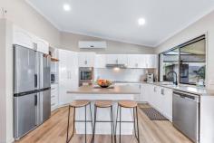  5 South Molle Boulevard Cannonvale QLD 4802 $690,000 Perched high above the ground, located in one of Cannonvale's most central neighbourhoods, sits this well-presented elevated home that gives a country feel. Enjoy convenience only a few minutes away from Whitsunday Plaza Shopping Centre. With public transport within walking distance, this property is in a prime position just a 10-minute drive from the buzz of the Airlie Beach main street. This tranquil family home has three generous bedrooms with aircon and built-in wardrobes, whilst the master bedroom has its own walk-in wardrobe, ensuite bathroom and access to the balcony. The open plan kitchen lounge area which looks onto the sizeable timber veranda creates a breezy indoor-outdoor living experience which makes entertaining guests effortless. Fully airconditioned, year-round comfort is assured. The immaculate kitchen has been recently refurbished and modernised complete with electric stove, oven and dishwasher. The block itself is 853m² and is filled with beautiful tropical gardens, which are very easy to maintain with an automatic reticulated irrigation system thoughtfully fitted throughout the front and rear of the property. Underneath the property is a double garage with side access as well as an ample space which the current owner planned to turn into another room, perfect for teenagers. 