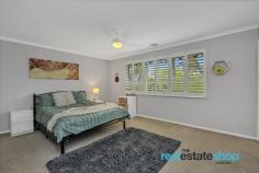  2 Jenks Pl Evatt ACT 2617 $1,295,000 This beautifully presented family home offers a spacious and flexible floor plan to accommodate growing and extended families. With 309 square metres of living, this home features 6 large bedrooms, three bathrooms and a media room. The downstairs bedroom has three way access, with a bathroom and kitchenette, ideal for a home business, separate flat or teenage retreat. Upstairs, the master bedroom is expansive with a walk in robe and ensuite, and all other bedrooms are a generous size with built in robes. The property is located in a tightly held suburb, nestled on a landscaped block with private surroundings and stunning views of the Brindabellas from the upper level. There is a family friendly backyard with a pergola, ready for summer gatherings, and a private colonial style verandah at the front – the perfect spot to relax. The two driveways are a great bonus; accommodating up to 10 cars and space for a boat, trailer or caravan. This home is conveniently positioned within walking distance to St Monica’s Primary School, Copland College, Miles Franklin Primary School and Evatt Shops and is only a short drive to the Belconnen Centre, Calvary Hospital and University of Canberra. Features: -Family friendly home with 309 square metres of living -Landscaped block with lush, established gardens -Enclosed carport, plus 2 driveways and off street parking for approx 10 cars -Media room with abundant storage- great space for a gym or extra living -Modern kitchen with fantastic storage, lots of bench space, breakfast bar and dishwasher -Spacious master bedroom with walk in robe and ensuite -Additional bedroom downstairs with ensuite, kitchenette, separate entry and storage -All other bedrooms have built in robes -Evaporative cooling -Ducted gas heating -Split system heating and cooling -Modern bathroom with separate toilet -Generous sized laundry with storage -Linen press on both levels -Walking distance to St Monica’s Primary School, Copland College, Miles Franklin Primary School and Evatt Shops 