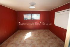  223 Dunkley Circuit Pink Lake WA 6450 $450,000 Abundant wildlife surrounds this Rural Residential 3.33Ha lot just 12km from Esperance CBD. The tree lined approach reveals a massive 25m x 12m Colorbond shed with approved 11m x 12m living quarters which includes kitchen, bathroom, bedroom, living area and mezzanine level with office and storage. 3 bay undercover storage with pit and high clearance roller doors leading into shed. Approx 34,000L rainwater storage with bore backup. 