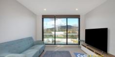  10/90 Lowanna St Braddon ACT 2612 $650,000 Perched upon the 3rd floor of this modern apartment complex with breathtaking panoramic views directly up to Mt Ainslie. A bright and sunny 2 bedroom ensuite apartment. In impeccable condition this larger than the average for a 2 bedroom apartment at 90m2 boasts an open plan lounge dining flowing onto a spacious 8m2 tiled balcony. Your morning coffee and croissants can be savoured whilst marveling at the sun rising over Mt Ainslie in the foreground. Both bedrooms have built ins, whilst air-conditioning/heating keeps the ambient temperature consistent the whole year round. A quality kitchen features extensive cupboard and bench space, electric appliances, including built in microwave, fridge and dishwasher. Secure lift access transports you directly into the basement with double adjoining car spaces and 1.9m2 storage shed. A wonderful location on street back from Northbourne Avenue and the tram station or a leisurely stroll into the heard of Lonsdale St and the City Centre with all its accompanying features and facilities. Was recently rented at $620 per week. It’s quiet, secure, central, rooms, sunny and immaculate. Apartment living at its finest. A rare offering and on that should appeal to a wide range of buyers. Highlights • 2 bedroom ensuite 3rd floor apartment • Both with mirror robes • Lift access • Separate entrance hall • Combined lounge-dining area opens onto a tiled 8sqm balcony • Air-conditioning/heating • Well appointed kitchen with generous cupboard and bench space • Electric appliances, microwave, fridge and dishwasher • Combined bathroom and toilet • European styled laundry with washing machine and dryer • Breathtaking views towards Mt Ainslie • Northern and easterly windows and sliding doors • Double secure garaging (next to each other) • Centrally located, very close to the tramline. Walk to Civic and ANU 