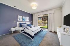  148 Heagney Crescent Chisholm ACT 2905 $839,000 Perfectly placed on a 776sqm block in the heart of Chisholm is this three bedroom two bathroom home. Beautifully renovated inside and out, this is a great find for a family or astute investor seeking a quality long-term investment. The interior features generous living areas and a stunning new kitchen with a waterfall island bench, integrated oven, induction cooktop, and superb cabinetry. Perfect for entertaining, the adjoining family room flows out to a large covered outdoor area with pull-down screens for shade and privacy, and ceiling fans and heaters for added comfort. All three bedrooms are freshly carpeted, and both the ensuite and main bathroom have been stylishly renovated with quality fixtures and fittings. Working from home will never be an issue again thanks to the detached rumpus room fitting with reverse cycle heating and cooling and cabled network port which is perfect for use as a home office or creative studio. There are an abundance of parks and playgrounds within walking distance, while Calwell shops, Erindale centre, Woden, and Tuggeranong are all just a short drive away. Features: 776sqm block Easy care gardens Living room with new carpet Beautifully renovated kitchen with stone benchtops, stunning cabinetry Central heating and cooling Family room opens to a large outdoor entertaining area Main bedroom with WIR and renovated ensuite Two additional bedrooms with built-in robes Renovated main bathroom Renovated laundry Large covered outdoor entertaining area with privacy screens, ceiling fans and heaters Grassed backyard Detached rumpus or home office with A/C and network port (approx. 25sqm) Oversized double garage with automatic roller door 