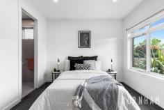  2/5 Afton St Aberfeldie VIC 3040 $1,4000,000 - $1,500,000 Contemporary living in a prime blue chip locale. This four-bedroom home boasts bright, airy spaces, generous proportions and a quality build. Entertain with ease in the grand lounge, dining and kitchen zone. This area is open plan, light-filled and opens to the courtyard, making indoor/outdoor living effortless. The heart of the home, the kitchen, flaunts a large island bench, separate pantry, glass splashback, Caesar stone benchtops, two-tone cabinetry, 900 gas cooktop, SMEG appliances and a double sink. The master suite is sure to impress. Enveloped in light, it becomes the perfect space to unwind. It features a generous walk-in robe and private ensuite with an extra large shower. The secondary bedrooms are bright and contemporary with mirrored built-in robes. They are serviced by a central bathroom with tub, window for natural light, floor to ceiling porcelain tiles, separate toilet, shaving cabinets, vanity with storage and shower niche. Less than 15kms from the heart of Melbourne’s city, an abundance of amenities are at your doorstep. Clifton Park is only metres away, Buckley Street shops, restaurants and cafes, the Maribyrnong River, coveted primary and secondary schools, numerous parklands and Essendon train station are close-by. Key features: – Powder room on the lower level – Walk-through laundry with storage and bench space – Large, fenced, established front garden – Paved courtyard – Remote-controlled garage with backyard access – Shed – Large linen cupboard upstairs – Porcelain tiles in living space and bathrooms – Solid timber staircase with under-stair storage – Ducted heating and evaporative cooling throughout – Window furnishing throughout – Flyscreens and security doors 