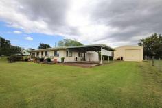  77 Newton Street Monto QLD 4630 $385,000 Lowset solid concrete block family home set in an elevated position. New colourbond roof, mobility friendly ramps and rails to both front and rear entrance, security screens to windows and doors Town water plus 20,000 litre rainwater tank with pressure pump. House can run either on town water or rainwater. Full length enclosed and screened rear patio area. Set in an elevated position on the edge of a cul-de-sac in a recent developed estate the home has a rural outlook and is just two blocks to main shopping centre of Monto. Fully air conditioned plus a slow combustion wood heater for the cooler months. Enclosed colourbond shed with electric roller door, workshop bench, vice drill stand and grinder. Carport plus internal lockup garage. Landscaped, easy-care gardens with established fruit trees and 3mt x 3mt garden shed on concrete floor. Potential to work from home plus a great place to live 