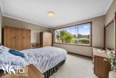  55 Hobart Road NEW NORFOLK TAS 7140 $545,000 This beautiful brick home will definitely appeal to first homebuyers as it’s as neat as a pin and nothing to do or for the garden enthusiast looking to down size. Consisting three bedrooms, two large living areas and a family friendly open plan kitchen-dining space with direct access to the undercover entertainment area. The kitchen provides an abundance of storage and bench space and having two separate living areas is always a bonus. Situated on a large allotment size of approximately 857 m2 the outside is an absolute credit to the current owner and features manicure gardens with watering system, 2 x garages, shed, workshop, green house fishpond/fountain and under house storage space. Conveniently located with public transport close by and within 10 minutes walk to town centre and approximately 5 minutes to the Tynwald Park 