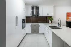  3/27 Walton Street Southport QLD 4215 Proudly presenting this immaculately presented apartment, positioned in a quiet leafy street near Chirn Park, one of the most sought after precincts on the northern Gold Coast. Easy walking distance to the Chirn Park café strip, central Southport and the beautiful Broadwater. Light rail station is conveniently located only 1.5km away, giving you full access to the entirety of the Gold Coast. Two generous size bedrooms, master with ensuite and balcony Split system air conditioning in each room and in the living area Modern kitchen with stone benchtops and dishwasher Spacious open plan tiled lounge and dining Huge outdoor patio area Two side by side secure carparks Complex pool, well maintained grounds Situated on the ground floor of the building, this low maintenance unit is perfect for investors, first homeowners or downsizers, looking for a comfortable lifestyle in a quiet street of Southport. With an open plan living area leading to the equipped kitchen complete with electric cook tops, tiled splash backs, dishwasher, oven and plenty of storage space, this property has all the essentials you could need. For your outdoor entertaining, an ideal space is the generous sized private balcony as well as the resort style pool in the complex. 