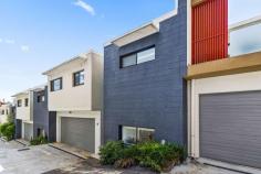  8/1-3 Woodlawn Avenue Mangerton NSW 2500 $800,000 - $880,000 Light-filled and welcoming, this tasteful townhouse provides the ultimate lifestyle for relaxed family living and is perfectly positioned in a quiet yet convenient location. The property boasts thoughtful design which maximises the elevated sunny aspect to every room and consists of a large open plan living area with a split system air-conditioning, flowing out to a generous outdoor entertaining space and yard. Featuring quality finishes right throughout and displaying house-like proportions in one of Mangerton's sought-after addresses, moments from top schools and city transport. Large modern kitchen with s/steel appliances, dishwasher & breakfast bar Three generous sized bedrooms all with built-in wardrobes Master bedroom with large ensuite & balcony Additional study area upstairs Modern bathroom with separate bath & shower Additional toilet downstairs & ample storage throughout Large outdoor area for all year-round entertainment Oversized double garage with internal access Moments from TIGS, Figtree Grove & Wollongong CBD 