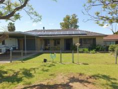  118 Segenhoe St Aberdeen NSW 2336 $525,000 There something to be said for keeping every easy and uncomplicated. You start on a Flat Block and then everything becomes simple and easy to look after. This Brick-Veneer home under a "Terra Cotta" tiled roof, fitted with solar and set with double! That's Double Garage and Double Carport.! The interior is sharp, clean and bright, with floating timber veneer floors, and some great floor to ceiling windows that showcase natural light throughout. The entry foyer gives you a wink into the expanse of the floor plan, and there's a sense of permanence about the build with a strong sturdy double brick feature wall in the Lounge/Living room. The kitchen has been remodeled and looks both slick and functional with a deep bank of roller draws, ceramic cook tops and over head storage cupboards. There a formal Dining room, and a sunny back family games room. All three (3x) bedrooms have BIW's and covered verandah areas front and back give excellent outdoors entertainment space. The Inground pool is ideal for summer fun, and there a "Man Shed" all tooled up for some back yard cook-ups and yarn space.. 