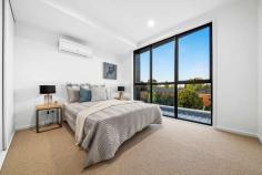  5/396-398 Elgar Road Box Hill VIC 3128 Just half an hour to the Melbourne CBD, 40 minutes to St Kilda Beach and just 8 minutes walk to the centre of bustling Box Hill and the train station, this epic four level townhouse vaunts an incredible five bedrooms, multiple living zones and a sunny top floor terrace lounge with exceptional views to Box Hill and further North. Set within a small, boutique complex, these architecturally designed residences are just as appealing on the outside as they are on the inside. An oversized double tandem garage and abundance of storage are located in the basement, while the ground floor offers luxurious open-plan living and formal sitting rooms, bolstered by stunning 2700mm high ceilings, square set cornices, LED pendants and down lights, timber laminate flooring and a plenitude of natural light. The top floor showcases an opulent study and lounge that lead out to the terrace balcony that boasts amazing views. The kitchen is expectedly high-end with light oak and black contrasting laminate cabinetry, 40mm stone bench tops, custom joinery and display shelving and a deluxe glass splashback. An integrated dishwasher complements the double undermount sink with an elegant gooseneck mixer, while the wall-mounted Miele electric oven and 900mm gas burner cooktop will delight home chefs. Air-conditioned bedrooms are spaciously spread across two levels, all flaunting plentiful built-in storage and three offering private ensuites. There are four top-tier bathrooms in this home, plus a separate powder room and ensuite for guests, and the inclusions are immaculate: full height shower tiles, semi-frameless screens, stone-top vanities and frameless mirrors. This incredible lifestyle residence is within an easy walk to the centre of Box Hill which includes the train station, shopping mall and precinct, medical, dining, cafes and town amenities. Parks and playgrounds are abundant, while the 767, 767 and 281 bus routes are all accessible within approximately 200m of your front door. Property Specifications: · Five bedrooms, four levels, four living areas, stunning townhouse in a highly sought-after location · Five highly appointed bathrooms plus separate powder room for guests · Loads of internal space as well an oversized basement with double tandem garage · High ceilings, LED lights, air conditioning, luxurious flooring · Amazing rooftop terrace balcony with sensational views · Premium position close to the centre of Box Hill 