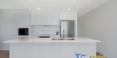  10/90 Lowanna St Braddon ACT 2612 $650,000 Perched upon the 3rd floor of this modern apartment complex with breathtaking panoramic views directly up to Mt Ainslie. A bright and sunny 2 bedroom ensuite apartment. In impeccable condition this larger than the average for a 2 bedroom apartment at 90m2 boasts an open plan lounge dining flowing onto a spacious 8m2 tiled balcony. Your morning coffee and croissants can be savoured whilst marveling at the sun rising over Mt Ainslie in the foreground. Both bedrooms have built ins, whilst air-conditioning/heating keeps the ambient temperature consistent the whole year round. A quality kitchen features extensive cupboard and bench space, electric appliances, including built in microwave, fridge and dishwasher. Secure lift access transports you directly into the basement with double adjoining car spaces and 1.9m2 storage shed. A wonderful location on street back from Northbourne Avenue and the tram station or a leisurely stroll into the heard of Lonsdale St and the City Centre with all its accompanying features and facilities. Was recently rented at $620 per week. It’s quiet, secure, central, rooms, sunny and immaculate. Apartment living at its finest. A rare offering and on that should appeal to a wide range of buyers. Highlights • 2 bedroom ensuite 3rd floor apartment • Both with mirror robes • Lift access • Separate entrance hall • Combined lounge-dining area opens onto a tiled 8sqm balcony • Air-conditioning/heating • Well appointed kitchen with generous cupboard and bench space • Electric appliances, microwave, fridge and dishwasher • Combined bathroom and toilet • European styled laundry with washing machine and dryer • Breathtaking views towards Mt Ainslie • Northern and easterly windows and sliding doors • Double secure garaging (next to each other) • Centrally located, very close to the tramline. Walk to Civic and ANU 