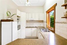 9 King St Glandore SA 5037 $1,050,000 to $1,150,000 Enjoying an enviable position along a quiet tree-lined cul-de-sac, you’ll find this renovated art deco home in wonderful company on King Street. A welcoming frontage with lovely timber-framed windows and a wide porch overlook neat front gardens and out to the street; the perfect place to muse with a morning cuppa. Generously proportioned with the distinctive high ornate ceilings, a central entrance is lined with timber floors and gives way to front positioned bedrooms on either side, including a roomy master with mirrored built-in robes and ceiling fan. A third bedroom is separated by a superbly refurbished bathroom accented with subtle neutral tones and a corner shower. Bathed in natural light, a rear family and dining area with large format tiles and a gas combustion heater is airy and open; timber framed café doors opening right up to reveal the ultimate alfresco entertaining space. Off to the side, a functional kitchen offers neutral shaker-style cabinetry, Asko dishwasher, wall oven, double sink, corner pantry, window opening onto the verandah and a servery and breakfast bar onto the family/dining. Here you’ll also find a convenient second bathroom with the charm of classic floor tiles, timber vanity and shower as well as plenty of room for all laundry facilities. A huge bonus also off the extension is a versatile extra room with split system reverse cycle air conditioner and doors directly onto the alfresco. A guest room, study, home office, fourth bedroom or additional living space, it will conveniently convert to whatever you need. Outside, entertainers will fall head over heels with the huge pergola-covered alfresco with handy outdoor sink and prime views of the perfect backyard. Endless lawn space is divided between manicured hedges, offering plenty of room for fun and games and respite for restless legs – two or four – concluding at a rear service yard with shed. More you’ll adore: - Ceiling fans + built-in robes to bedrooms 2 & 3 - Ducted evaporative cooling - Impeccable north-facing backyard - Solar panels - Secure roller door carport + plenty of extra off-street parking - The location An absolute gem of a spot just a few hundred metres from the Glandore Oval with playground, tennis courts and memorial rose garden, as well as Emerson Railway Station, the bus and local takeaway options and gyms. The highly regarded Black Forest Primary School is also within walking distance, with the Castle Plaza and Kurralta Park Shopping Centres within a couple of kilometres. Convenient to the tram and ten minutes to city; ten minutes to sea by car. What more could you ask for in a location? 