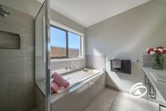  27 Ambleside Way Officer VIC 3809 $670,000 - $730,000 This stunning home on the north side of Officer is immaculately maintained and in near new condition. Offering three sizeable bedrooms, the master is accompanied by a beautifully presented ensuite and walk-in robe while the zoned secondary bedrooms boast double built-in robes and are serviced by the main bathroom and separate toilet located at the rear of the property. The entrance leads past a study nook into the heart of the home to a large open-plan living area, featuring a light filled lounge and generous meals area. The stunning hostess kitchen is an entertainers delight with stone work surfaces, a plethora of cupboards and draws and 900mm quality stainless steel appliances. Stepping outside to a private undercover alfresco area bordered by low maintenance garden and lush lawn. The creature comforts continue with ducted heating, 3 split systems, motorised window furnishings, LED lighting and a remote double garage with internal access. Close to quality schooling, including St Francis Xavier College, St Brigid’s Primary, Orchard Park Primary, amenities and parks such as Hicks Reserve its location is perfect for a wide array of purchasers. 