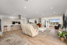  30 Grandview Crescent Armidale NSW 2350 30 Grandview Crescent is a master built and exceptional 5-bedroom home that is sure to impress the most fastidious purchaser. Located in one Of Armidales most prominent and elevated positions offering commanding and expansive views. Complete in 2015 by a renowned local builder the home was originally designed and finished as a "forever destination" A home built for the entertainer, a large galley style kitchen is surrounded by the main open plan living and dining area. The kitchen leaves nothing to be desired compiling a full suite of options including two in wall ovens, plus a 900mm freestanding option with 5 burner gas cooktop, dishwasher and rangehood all integrated into an expansive galley layout with excellent storage capabilities. The five-meter Island bench is also home to a breakfast bar and waterfall ends. In addition to the main open plan living, collapsible sliding doors entertain the opportunity to section off two further living spaces depending on the household or entertaining requirements. Both spaces also open onto the enclosed western facing indoor outdoor room complete with barbeque facilities and some of the finest views Armidale has to offer. The master bedroom is complete with en-suite and large walk-in robe. Floor to ceiling tiling, compliment a double vanity, shower and toilet. The main bathroom continues with floor to ceiling tiling, timeless design with the addition of a freestanding feature bath. The three remaining bedrooms all offer plus carpets underfoot, built in robes and continue with generous floor plan sizing. A fifth bedroom come home gym or study provides some extra versatility and option. All bedrooms are completed with stunning plantation shutters and LED down lighting. Ducted and zoned heating filters through the entire home, with a large grid connected solar power system and solar boosted gas hot water system assisting with electricity and gas costs and the convenience of CCTV for added security. An oversized double lock up garage is complete with an auto rolling sectional door and includes extensive built-in storage. Also available is developed under house storage room with concreted floor and power. The 1600 sqm block is fully fenced with developed multi-tiered retainer walls and is host to an automatic 8 zone irrigation system for the lawns and gardens. 