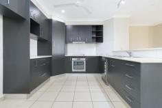  29 Miller Ct Gunn NT 0832 $650,000 Proudly perched on this elevated corner allotment and just a short stroll to central Palmerston, you will find this contemporary inspired four-bedroom home. Built with practicality in mind, you can enjoy functional living and entertaining all year round. Set on a 635sqm allotment this home is ideal for families, retirees, or an investor. Situated in a quiet street you will find that this home offers the very best in residential living. The spacious open dining and living area is overlooked by the gourmet kitchen and flows out to the large under cover entertaining patio through sliding doors. Entertaining with elegance and ease or enjoy the low maintenance lifestyle that this home offers, from the large main bedroom with WIR and ensuite with double vanity, 3 bedrooms with BIR’s, main bathroom with bath and shower – to the laundry and storeroom that sit alongside the carport and verandah. •Four good size bedroom, two bathroom stylish suburban home •Spacious open plan living and dining areas •Open living area, tiled with air conditioning and large windows •Centrally located kitchen with island bench and big pantry •Lovely main bedroom with WIR and ensuite •Main bathroom with separate bath and shower •Beautiful planted low maintenance gardens, auto irrigation •Quality split system air conditioning throughout •Ceramic tiles and internal laundry •Double carport right at the front door •High on a hill overlooking the suburbs of Gunn and Farrar The recent addition of 24 solar panel system to the roof is an added bonus for those looking for energy efficiency and reduced electrical charges. This location comes with lots of advantages, just moments to all major amenities, your choice of schools and just five minutes from Gateway Shopping Centre – leaving no desire unfilled. 