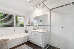  56 Karog St Pelican NSW 2281 $1,430,000 - $1,480,000 Looking for a home where you can relax while enjoying your private oasis lifestyle then don't go past this refreshingly redecorated home. Situated in the quiet suburb of Pelican this contemporary home is located between the aquatic playgrounds of Lake Macquarie and the coastal white sands of Nine Mile Beach. Upon entering this home you will be embraced by natural light and so much space, with a 1500 mm wide entry hallway, a featured coffered ceiling, and a square set opening to the lounge and family areas enhances the beauty of this property. Offering 4 generous size bedrooms with mirrored built-in robes the primary bedroom is generous in size and features a walk-through his and her robe leading to the beautifully appointed ensuite with a wall-to-wall shower recess, double vanity sink, and Quantum Quartz stone tops. While the main bathroom features a good size bath & shower along with a spacious 40mm stoned vanity and 1200mm high feature tiling to the walls and a separate WC for your convenience. With an abundance of open-plan living and entertaining spaces, there is plenty of room for all your family to relax and enjoy. The contemporary style kitchen has plenty of cupboard space, a generous walking-in pantry, a wide island bench with 40mm stone tops with a dropped-in double sink, and stylish overhead lighting. The kitchen overlooks the family living area and the family dining space. After dinner with the family, you can wander over to the quiet family room where you can relax, watch a movie, read a book, or delight in the ambiance of the feature combustion fireplace in the winter months. Heading outside to the undercover area where you can bask in the north-facing living while taking in the cool summer afternoon breeze or head to your secluded deck with tropical garden features, fishponds, and waterfalls. With low maintenance, landscaped gardens to care for you will have plenty of time to enjoy all the local area has to offer, aquatic waterways for swimming and fishing, boating, and jet skiing as well as exploring the parklands for a stroll, picnic, and bike tracks along the Pelican foreshore. • Garaged parking for the family car with an extra high opening remote door to accommodate a 4WD • Open air and undercover parking for the boat or caravan • Extra rear garage or workshop for tinkering in • Ducted air conditioning with 4 zones and ceiling fans • Upgraded kitchen appliances with an induction cooktop and pyrolytic oven • Internal laundry with external access. • Feature Aluminum plantation shutters and lights • External power points front and back of the house • 15amp external power point outlet for a caravan • Security throughout the home - cameras, alarm systems, doors, and windows • Roof and wall insulation • Close to schools, specialty shops, large supermarkets, clubs/pubs, and restaurants. 