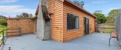  175 Princes Hwy Bodalla NSW 2545 $1,160,000 “Bealga” – The current owners have maximised the property’s potential by creating many different areas and infrastructure that could bring in a healthy income, or homes for extended family members. Each building and garden space is separately fenced, along with a chook pen and established orchard. The property is 5110 m2 and zoned RU5 Village. Main House: 2 bed 2 bath- approved as main residence. Was two one bedroom units but has been converted back to a single residence with two bathrooms, two bedrooms, two kitchen and open living area with a wood burning fireplace. Covered veranda and a back deck with views of Bodalla's green pastures. Currently not tenanted but could achieve rent of $300 per week (larger side), $160 per week (bedsit) or as one residence approximately $400 per week. Second House: Approved as the second dwelling. Open plan kitchen, living space and bedroom with a separate bathroom/laundry. Spacious layout with cathedral ceilings. Currently rented month to month at $220 pw but should be able to achieve higher rent at $300 pw. Bunk house: This building is approved as a bunkhouse/studio and comprises of a separate bedroom, bathroom/laundry, lounge/dining space and a kitchen. Also under the same roof line with a roller door access on the outside and an internal door is 6 m x 6 m shed space. It is currently rented month to month at $230 pw however should achieve a higher price at $300 pw. Garage and workshop: With a total area 6 m x 6 m and split in two sections. One side Has a small kitchenette, 2.6 m x 1.8 m working cool room, separated bedroom space, bathroom/laundry with external access. The other shed section has extra high roller doors at both ends and is perfect for a trades person or a handyman to run his business from or parking for your caravan and large boat. Produce Market:  Fenced space and has its own disabled bathroom, water and power on the site. Perfectly set up to sell your produce or plants. Great high traffic position right on the highway in Bodalla in a 60 km zone. Cook house/run and Animal pens: Currently running chickens and the other fenced areas have been used as shelters for pigs and calves. There is an established orchard with a mixture of fruit trees, plus there is extra flat land to put more buildings (STCA), park caravans or boats or just plant to your hearts content.  