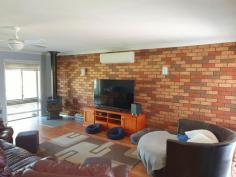  118 Segenhoe St Aberdeen NSW 2336 $525,000 There something to be said for keeping every easy and uncomplicated. You start on a Flat Block and then everything becomes simple and easy to look after. This Brick-Veneer home under a "Terra Cotta" tiled roof, fitted with solar and set with double! That's Double Garage and Double Carport.! The interior is sharp, clean and bright, with floating timber veneer floors, and some great floor to ceiling windows that showcase natural light throughout. The entry foyer gives you a wink into the expanse of the floor plan, and there's a sense of permanence about the build with a strong sturdy double brick feature wall in the Lounge/Living room. The kitchen has been remodeled and looks both slick and functional with a deep bank of roller draws, ceramic cook tops and over head storage cupboards. There a formal Dining room, and a sunny back family games room. All three (3x) bedrooms have BIW's and covered verandah areas front and back give excellent outdoors entertainment space. The Inground pool is ideal for summer fun, and there a "Man Shed" all tooled up for some back yard cook-ups and yarn space.. 