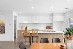  2/5 Afton St Aberfeldie VIC 3040 $1,4000,000 - $1,500,000 Contemporary living in a prime blue chip locale. This four-bedroom home boasts bright, airy spaces, generous proportions and a quality build. Entertain with ease in the grand lounge, dining and kitchen zone. This area is open plan, light-filled and opens to the courtyard, making indoor/outdoor living effortless. The heart of the home, the kitchen, flaunts a large island bench, separate pantry, glass splashback, Caesar stone benchtops, two-tone cabinetry, 900 gas cooktop, SMEG appliances and a double sink. The master suite is sure to impress. Enveloped in light, it becomes the perfect space to unwind. It features a generous walk-in robe and private ensuite with an extra large shower. The secondary bedrooms are bright and contemporary with mirrored built-in robes. They are serviced by a central bathroom with tub, window for natural light, floor to ceiling porcelain tiles, separate toilet, shaving cabinets, vanity with storage and shower niche. Less than 15kms from the heart of Melbourne’s city, an abundance of amenities are at your doorstep. Clifton Park is only metres away, Buckley Street shops, restaurants and cafes, the Maribyrnong River, coveted primary and secondary schools, numerous parklands and Essendon train station are close-by. Key features: – Powder room on the lower level – Walk-through laundry with storage and bench space – Large, fenced, established front garden – Paved courtyard – Remote-controlled garage with backyard access – Shed – Large linen cupboard upstairs – Porcelain tiles in living space and bathrooms – Solid timber staircase with under-stair storage – Ducted heating and evaporative cooling throughout – Window furnishing throughout – Flyscreens and security doors 