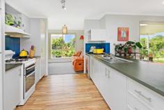  38 HAKEA AVENUE MALENY QLD 4552 $785,000 Positioned high in Hakea Avenue to capture the breeze and light, is this low maintenance, much loved home. Offering 4 bedrooms, the main bedroom boasts a generous walk-in robe and large en suite; there is plenty of space on offer for a family and their visitors. An open plan kitchen and dining flowing to the covered outdoor entertaining area completes the perfect entertainer's home. A practical floorplan, dishwasher, gas cooktop and loads of storage will make everyday living a breeze. Past owners of this home, and its current owner, have thoughtfully tended the garden to create edible herbs and fruits, flourishing natives and a 27-year-old espaliered grape vine. The outdoor space offers a serene but productive space with a meditation platform perfectly placed to take in the surrounding nature; feeding bees and birds thrive in this garden and its bounty. • Low maintenance, low set, brick home • Four bedrooms; main with en suite and walk-in robe • Two-way family bathroom with full size bathtub and separate shower • Open plan dining and kitchen • Kitchen with dishwasher, gas cooktop and good bench space • Fantastic storage throughout • Ceiling fans in each room, whirly birds and insulated window blinds • Lock up garage with internal access • Garden shed • Solar hot water • Thriving, established fruits and herbs; Lemon Thyme, Purple Basil, Pawpaw, Banana, Tamarillo, Monstera Deliciosa, Mulberry, Passionfruit and abundant Citrus. • Planted by a previous Italian owner and now perfect for Dolmades is the grape vine. 