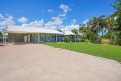  65 Brandt Rd Knuckey Lagoon NT 0828 This beautifully presented 4-bedroom, 2-bathroom ground level home plus a fully self-contained granny flat is situated on 2ha (5acres approx.) of land and is a rare opportunity to purchase in this sought-after location of Knuckeys Lagoon. Offering all the benefits of a rural lifestyle, with the ease of access to all Darwin has to offer. The main house is freshly painted and located towards the centre of the block, offering multiple living areas, modern kitchen with ample storage space and a large island bench for all your cooking requirements. The 4 spacious bedrooms all include built in robes, split system air conditioning and the home is tiled throughout. The large entertainer’s veranda encases the home and over looks the manicured land which is fully reticulated and runs off the properties tank water. Sit under the veranda with the cool rural lifestyle breeze and additional ceiling fans, overlooking the magnificent pool surrounded by luscious plants and palm trees enjoying the serenity. This block really offers all there is, including a basketball court, ample space for cars, boats, trailers, storage container and an additional shed storage off to the side of the house. The fully self-contained granny flat is located at the front of the property along with the large industrial Shed and is completely fenced from the main house. House: * 4 Bedrooms, Main bedroom with ensuite * Main Bathroom includes a Full length Bath and separate shower * Tiled and airconditioned throughout * Stunning Kitchen, functional with large island bench, every cooks dream * Two large separate living areas, the second can be closed off * Fantastic laundry with loads of cupboard and bench space * Large entertainers balcony overlooking the manicured land * Swimming Pool with waterfall surrounded by landscaped palms * 2.23ha of manicured land * Large Industrial sized shed * Basket Ball court 