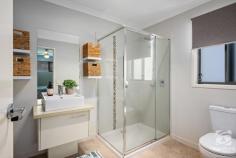  23 Whistler Concourse Bandiana VIC 3691 $715,000 ''More than meets the eye'' is thrown around too often in real estate, but this home certainly meets the criteria. The simple façade can be deceiving to the work that has been completed, and the high quality which lies through the entrance of the home. The oversized master, located at the front of the home offers a large walk-in wardrobe and ensuite that feature a separate shower and floating stone single vanity. The remaining three bedrooms offer ceiling fans, wardrobes, and carpet. These are located central to the neutral-toned, light and bright bathroom, continuing the design as the ensuite with the addition of a bath. The free-flowing floor plan offers two separate living areas, with an expansive window featured in the central living space attracting a large amount of natural light, with views of the backyard. Enjoying your drink of choice whilst watching a good movie or reading a book, the ideal place to get away and relax in private. The newly renovated kitchen has been designed to perfection with high-end appliances. The thoughtful layout, practical storage options, and corner cabinets ensure all space is used efficiently. The kitchen overlooks the main living and dining areas with the focal point being the fireplace, creating warmth and ambience second to none. Leading out from the dining area the alfresco is the ideal location for those that like to entertain, enjoying all the low-maintenance yard has to offer. Other notable features include ducted heating and cooling, rear yard access, gas hot water and a fully integrated yard. 