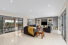  25 JARVIS STREET BERRI SA 5343 $660,000 Originally built as one of 'Frank Nesci Homes' executive show homes, this property oozes elegance, charm and sophistication. Sitting on approx. 702sqm, the home is conveniently located in one of Berri's most sought after subdivisions. Presenting a spacious 4 bedroom, 2 bathroom home of approx. 237sqm, an inviting passage that leads you straight to the back of the home into the bright & spacious open plan living area. A modern kitchen overlooking the spacious open plan living zone, offering plenty of storage within contrast cabinetry and a large BIP, stainless steel appliances including a gas cooktop. And, of course, you can't forget about the convenience of built in wine storage! The large main bedroom enjoys the luxury of a large built-in robe, built in dresser with a huge mirror and a private ensuite bathroom. With built-in robes to the other bedrooms and a study with the flexibility of being a 5th bedroom or second lunge/kids retreat. Further features to enjoy: • Ducted reverse cycle air-conditioning throughout home • Natural gas heating in the main living area • Home has recently been painted throughout • 2 x carport UMR with freshly painted floor • Solar - 29.5KW • Enclosed backyard • Rainwater storage • Land Size: approx. 702sqm 