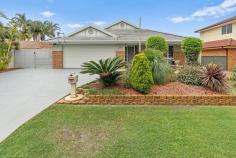  56 Karog St Pelican NSW 2281 $1,430,000 - $1,480,000 Looking for a home where you can relax while enjoying your private oasis lifestyle then don't go past this refreshingly redecorated home. Situated in the quiet suburb of Pelican this contemporary home is located between the aquatic playgrounds of Lake Macquarie and the coastal white sands of Nine Mile Beach. Upon entering this home you will be embraced by natural light and so much space, with a 1500 mm wide entry hallway, a featured coffered ceiling, and a square set opening to the lounge and family areas enhances the beauty of this property. Offering 4 generous size bedrooms with mirrored built-in robes the primary bedroom is generous in size and features a walk-through his and her robe leading to the beautifully appointed ensuite with a wall-to-wall shower recess, double vanity sink, and Quantum Quartz stone tops. While the main bathroom features a good size bath & shower along with a spacious 40mm stoned vanity and 1200mm high feature tiling to the walls and a separate WC for your convenience. With an abundance of open-plan living and entertaining spaces, there is plenty of room for all your family to relax and enjoy. The contemporary style kitchen has plenty of cupboard space, a generous walking-in pantry, a wide island bench with 40mm stone tops with a dropped-in double sink, and stylish overhead lighting. The kitchen overlooks the family living area and the family dining space. After dinner with the family, you can wander over to the quiet family room where you can relax, watch a movie, read a book, or delight in the ambiance of the feature combustion fireplace in the winter months. Heading outside to the undercover area where you can bask in the north-facing living while taking in the cool summer afternoon breeze or head to your secluded deck with tropical garden features, fishponds, and waterfalls. With low maintenance, landscaped gardens to care for you will have plenty of time to enjoy all the local area has to offer, aquatic waterways for swimming and fishing, boating, and jet skiing as well as exploring the parklands for a stroll, picnic, and bike tracks along the Pelican foreshore. • Garaged parking for the family car with an extra high opening remote door to accommodate a 4WD • Open air and undercover parking for the boat or caravan • Extra rear garage or workshop for tinkering in • Ducted air conditioning with 4 zones and ceiling fans • Upgraded kitchen appliances with an induction cooktop and pyrolytic oven • Internal laundry with external access. • Feature Aluminum plantation shutters and lights • External power points front and back of the house • 15amp external power point outlet for a caravan • Security throughout the home - cameras, alarm systems, doors, and windows • Roof and wall insulation • Close to schools, specialty shops, large supermarkets, clubs/pubs, and restaurants. 