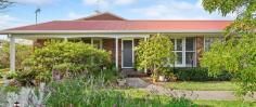  16 Paraboon Dr Bermagui NSW 2546 $920,000 "Amaani" - Located within an easy walk to Beares Beach, Bermagui Golf Course and the very popular Blue Pool is this single level easy care family home on a corner block. The Home: Large windows allow the light to stream into this very comfortable well maintained home. Three good sized bedrooms all with built in robes, modern bathroom, lounge, kitchen/dining area, walk in butlers pantry with a washing machine. The lounge and dining room have bay windows and plantation shutters. The kitchen was professionally designed and built by "Kitchens of Choice", renowned for the their quality workmanship, and features a farmhouse sink, induction cook top and limestone bench tops. Yard & Gardens: Landscaped gardens add privacy to the home, and there is a fully fenced yard which is an suntrap, ideal for growing vegetables, citrus trees, shrubs and flowers. Garage: A spacious single garage with workshop space and large cupboards for storage. The rear door gives you access to the path at the rear of the home. Location: Within a short walk to Bermagui Golf Course, Beares Beach, Blue Pool and a stroll to the main shopping area, Horseshoe Bay Beach, restaurants, cafes, doctors, hardware shop and the wharf complex. 