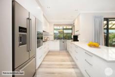  12 Cambridge Street Creswick VIC 3363 $580,000 - $590,000 Sure to impress, introducing this modern three-bedroom home, located in a beautiful tree lined street in a central location, walking distance to shops, schools and all the amenities thriving Creswick have to offer. Upon entry you will be delighted with the open floorplan, quality furnishings and welcoming appeal. Nothing to do but to move in and make it your own. • Presenting three spacious bedrooms, two with BIRS, master with ensuite and direct access to covered pergola area. All bedrooms have new carpets and quality curtains all in neutral palette. • Contemporary custom-made modern kitchen is sure to please with stainless-steel appliances including dishwasher, ample cupboard space, huge pantry and long stone benchtops all leading onto large dining/ family room with direct access to outdoor undercover area making entertaining a breeze. • The spacious second living area offering a separate living space, teenage retreat or playroom. • Rest assured you will be kept cosy with natural gas ducted heating. • Quality flooring throughout with new carpets in bedrooms, beautiful timber look vinyl flooring in all other areas. • Modern and functional bathroom with large bath, shower and vanity. • Large undercover pergola complete with beautiful fishponds make for a very tranquil setting. • External features include Double garage with direct access to the house, huge 3 bay shed with room ideal for office compete with concrete, power and roller door,14 solar panels, and 3 x 9,000litre water tanks. 