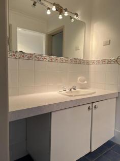  18 Obley St Yeoval NSW 2868 $435,000  This beautiful home is not what you expect looking at it from the outside. It is roomy and has many features set on a large 2023 M2 block o 3 Bedrooms, 2 with large built-in robes and all with ceiling fans. Two of the bedrooms have split systems o Formal lounge o Large Family room with a split system and ceiling fan. Picture window overlooking back yard and double glass sliding doors to the back deck o The kitchen features an oven with a real grill, 2 door dishwasher, large storage drawers, microwave nook, ceiling fan, ceiling exhaust, and a range hood o The dining room is off to the side of the kitchen with polished timber floors o 3-way bathroom with large vanity, deep bath, shower stall, and Toilet o Carpet in Bedrooms and formal lounge and Family room o The back deck is the feature of this property with ceiling fans and plenty of room to party. o Garage with electricity, room for 2 small cars lengthwise and a carport. o Two large water tanks 