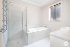  12 Cambridge Street Creswick VIC 3363 $580,000 - $590,000 Sure to impress, introducing this modern three-bedroom home, located in a beautiful tree lined street in a central location, walking distance to shops, schools and all the amenities thriving Creswick have to offer. Upon entry you will be delighted with the open floorplan, quality furnishings and welcoming appeal. Nothing to do but to move in and make it your own. • Presenting three spacious bedrooms, two with BIRS, master with ensuite and direct access to covered pergola area. All bedrooms have new carpets and quality curtains all in neutral palette. • Contemporary custom-made modern kitchen is sure to please with stainless-steel appliances including dishwasher, ample cupboard space, huge pantry and long stone benchtops all leading onto large dining/ family room with direct access to outdoor undercover area making entertaining a breeze. • The spacious second living area offering a separate living space, teenage retreat or playroom. • Rest assured you will be kept cosy with natural gas ducted heating. • Quality flooring throughout with new carpets in bedrooms, beautiful timber look vinyl flooring in all other areas. • Modern and functional bathroom with large bath, shower and vanity. • Large undercover pergola complete with beautiful fishponds make for a very tranquil setting. • External features include Double garage with direct access to the house, huge 3 bay shed with room ideal for office compete with concrete, power and roller door,14 solar panels, and 3 x 9,000litre water tanks. 
