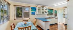  2 Jill St Brighton QLD 4017 $875,000 With two street frontages at the entry of a quiet cul-de-sac and surrounded by other established and cared for homes, this highset timber classic is both as spacious as it is versatile. Let's start by admiring the practicality of the huge 12m x 8m x 3.6m high powered council approved shed with 8 metre access driveway.   In here you will have secure lock up for 4 vehicles or a combination of boats, caravans or even a truck!  There are also functional workbenches and the tool timber cabinet and crane hoist will stay. The welcoming family sized front deck captures views of the kite surfers and beautiful sea breezes flow through the easy access french doors to the main living / dining area. There are stunning timber hardwood floors throughout the upper level which is move in ready but could be renovated easily to suit your taste and requirements. Off the dining is a well appointed kitchen with brand new dishwasher, ample cupboard space, gas cooking and large pull-out pantry. The lower level features a clever layout which includes a laundry with extra sink space, garage, family room, 2nd bathroom and extra front door access to 2 utility rooms.  This area would be ideal to host your own home business or have separation and extra space for the in-laws or growing teenagers. Further quality features of the home include: * Solid chamferboard construction with tiled roof located on an elevated 604sqm corner allotment. * Easy to clean tiled floors and gyprock interior downstairs; * Brand new left-hand side roller door on shed with extra double power outlets; * Efficient Custom Concrete drainage to street, rainwater tank and new gas HWS; * Morning protective sunshades on the front deck. With a fully secured yard, low maintenance gardens and a well-constructed Balinese Hut for added entertaining space, this property is already set up for success. Well positioned, just a short downhill stroll to the waterfront, also connecting you with transport options, childcare centre, public and private schools, shopping, restaurants and more. 