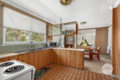  2 Ulster Street Peakhurst NSW 2210 Nestled in a quiet, leafy cul-de-sac, this original, red brick home has a very sensible layout and fabulous storage/workshop space. Set on a very wide block of approx 637sqm, this house has a lovely district outlook and views over Salt Pan Creek. Located in a very convenient position, there is easy access to schools, Hurstville Golf Course, local shopping strips, buses, Riverwood railway station and Gannon's Park. This well-maintained home has 3-4 bedrooms, dining room and a living room that opens out to the large, wrap around balcony. However, there is real potential to add additional living areas (STCA), with a large storage space opening off the lock-up garage. - 3 spacious bedrooms and an office/4th bedroom downstairs - Original kitchen opens onto the dining room - Leafy outlook with water views of Salt Pan Creek - Lock up garage with large workshop or storage space - Great potential to renovate or rent out - Second shower & toilet off the internal laundry - Front and rear balconies enjoy the peaceful outlook - Moments away from Peakhurst's / Lugarno's / Riverwood's amenities 