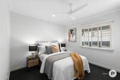  256 Verney Rd E Graceville QLD 4075 Perfectly fusing classic charm with modern functionality, this tastefully-renovated workers' cottage will capture the attention of many buyers, including those searching for a first home, couples, young families, entertainers and downsizers alike. Boasting a sparkling new magnesium swimming pool, superb entertainment options and beautiful interiors, this 1950s-built lowset dwelling is set on a private 405sqm allotment close to local conveniences and leafy parklands. It is also within the prestigious Graceville State School catchment. Thoughtfully updated while retaining the original character of the residence, this delightful cottage evokes a warm first impression with its appealing façade and covered front verandah. Set away from the street, the property is also framed by established gardens and high fences with gated archway entry. Inside, timber floors are complemented by a calming neutral colour palette. Taking inspiration from the blossoming jacaranda tree on the residence’s nature strip, ‘Jacaranda’ flows from its welcoming entry with a floral-style leadlight window to a warm and welcoming interior. Recently renovated, the property's kitchen displays crisp white cabinetry, stone benchtops, breakfast bar, walk-in pantry and quality appliances including a Bosch dishwasher and a Fisher & Paykel oven and cooktop. The floor-plan offers comfortable separation from the sleeping zone. Expect four well-sized bedrooms, including a carpeted and air-conditioned master bedroom and three additional bedrooms. A renovated main bathroom has floor-to-ceiling tiling and a separate bath and shower. Encouraging indoor-outdoor living, a covered patio seamlessly connects to an indoor/outdoor living area. Here, gather loved ones to relax with al fresco dining being the center of focus. Cook up a barbecue or unwind with a refreshing beverage. The glass-framed in-ground, magnesium swimming pool provides a tranquil backdrop for entertaining, while the fully-fenced surrounding garden features mature plantings and a children’s cubby house that is perfect for young ones and pets to enjoy. Continuing the home’s living space, the added poolside extension encompasses a generous multi-purpose area that can serve as a media room, home office or guest suite. A linked study is ideal for students or those who work from home. A second bathroom and a laundry service this extra space. The residence also includes off-street parking for one vehicle, ceiling fans throughout, excellent storage and air-conditioning across the kitchen, lounge and dining and master bedrooms. A leisurely stroll from Girraween Park’s playgrounds, local netball courts, riverside cycling routes and walking pathways, this impeccable home is also near the popular Graceville Riverside Shopping Centre's café’s, restaurants, local convenience store, bakery and Goodlife Gym. Fashionable Honour Avenue's boutiques, cafes and restaurants are a stone's throw away. The Graceville train station, Indooroopilly Shopping Centre and UQ’s Saint Lucia campus are minutes away. Falling within the Graceville State School and Corinda State High School catchment areas, this sensational property is a short drive from Christ the King Primary School, Saint Aidan’s Anglican Girls’ School and Saint Joseph’s Catholic Primary School.  