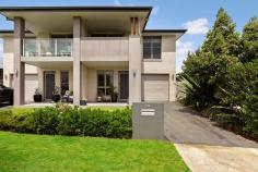 20 Threlkeld Crescent Fletcher NSW 2287 Located in one of Newcastle's most sought-after areas for young families, this six-year old townhouse is modern in design and big on space featuring three separate living and dining areas, and three-bedroom plus study accommodation, along with a great size garden for kids and pets to run around. An exceptionally peaceful street in the Sanctuary Estate, you will never tire of sitting on the front verandah gazing out over the Hunter Wetlands while listening to the sounds of bellbirds. Step inside and enjoy the appeal of the flowing ground floor layout offering interchangeable lounge, family and dining areas, along with a contemporary kitchen crafted with stone benchtops, gas cooking, excellent storage, and a dishwasher. Refreshingly different, this townhouse benefits from having a great size yard as well as a paved alfresco entertaining area. Three robed bedrooms, master with walk-in robe and ensuite, and a glamorous main bathroom enjoy a superior level of privacy upstairs, while this trendsetting abode also features a study desk and rare third living space. Air-conditioning, guest powder room, large laundry and a remote single garage with an additional car space in front all add a fine finishing touch. The Sanctuary Estate promises laidback living with instant access to sporting fields, children's playgrounds, childcare, on-site medical facilities, and a community centre. A choice of schools, major supermarkets and speciality shops are all nearby. Newcastle CBD and beaches are just 25 minutes away and the M1 Pacific Motorway and Hunter Expressway are easily accessible. - Contemporary duplex townhouse built c.2016 positioned opposite Hunter Wetlands - Flowing layout with two separate living/dining areas downstairs, and third upstairs - Caesarstone kitchen with gas cooktop, electric oven, dishwasher - Three robed bedrooms plus study nook, master with walk-in robe and ensuite - Upper level verandah has gorgeous Wetlands outlook - Rear paved alfresco entertaining area and fenced backyard - Split system a/c to rear living area and master bedroom - Single garage with convenient internal access - Brilliant first or young family home or investment currently returning $520pw - In catchment for Glendore Public School and Callaghan College, 1600m to Bishop Tyrrell Anglican College, 8.5km to University of Newcastle - Four minute drive to Fletcher Shopping Village and medical suites - 10 minute drive to M1 and Hunter Expressway, 25 minutes to Newcastle CBD 