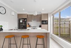  20 Threlkeld Crescent Fletcher NSW 2287 Located in one of Newcastle's most sought-after areas for young families, this six-year old townhouse is modern in design and big on space featuring three separate living and dining areas, and three-bedroom plus study accommodation, along with a great size garden for kids and pets to run around. An exceptionally peaceful street in the Sanctuary Estate, you will never tire of sitting on the front verandah gazing out over the Hunter Wetlands while listening to the sounds of bellbirds. Step inside and enjoy the appeal of the flowing ground floor layout offering interchangeable lounge, family and dining areas, along with a contemporary kitchen crafted with stone benchtops, gas cooking, excellent storage, and a dishwasher. Refreshingly different, this townhouse benefits from having a great size yard as well as a paved alfresco entertaining area. Three robed bedrooms, master with walk-in robe and ensuite, and a glamorous main bathroom enjoy a superior level of privacy upstairs, while this trendsetting abode also features a study desk and rare third living space. Air-conditioning, guest powder room, large laundry and a remote single garage with an additional car space in front all add a fine finishing touch. The Sanctuary Estate promises laidback living with instant access to sporting fields, children's playgrounds, childcare, on-site medical facilities, and a community centre. A choice of schools, major supermarkets and speciality shops are all nearby. Newcastle CBD and beaches are just 25 minutes away and the M1 Pacific Motorway and Hunter Expressway are easily accessible. - Contemporary duplex townhouse built c.2016 positioned opposite Hunter Wetlands - Flowing layout with two separate living/dining areas downstairs, and third upstairs - Caesarstone kitchen with gas cooktop, electric oven, dishwasher - Three robed bedrooms plus study nook, master with walk-in robe and ensuite - Upper level verandah has gorgeous Wetlands outlook - Rear paved alfresco entertaining area and fenced backyard - Split system a/c to rear living area and master bedroom - Single garage with convenient internal access - Brilliant first or young family home or investment currently returning $520pw - In catchment for Glendore Public School and Callaghan College, 1600m to Bishop Tyrrell Anglican College, 8.5km to University of Newcastle - Four minute drive to Fletcher Shopping Village and medical suites - 10 minute drive to M1 and Hunter Expressway, 25 minutes to Newcastle CBD 