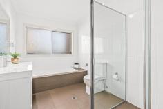  4 Hermitage Place Dapto NSW 2530 $1,250,000 This stunning family home of exceptional dimensions, exudes style and tranquility, overlooking farmland and the escarpment that is uniquely positioned on a 641m2 corner block. Every mans dream will become reality with a 4 car garage (ideal for the tradie or home business), loads of storage area under the house and double gates down the side of the home making it perfect for parking your van or boat. Inside is classy and contemporary with a true entertainers kitchen including all the luxury fittings like 40mm stone benches, 900mm oven and 5 burner gas cooktop. Multiple light filled formal and informal living rooms both up and downstairs, 4 great sized bedrooms, big showers in both the main bathroom and ensuite and with 4 toilets throughout the home. Peacefully set in a quiet cul-de-sac street you will feel a million miles a way with its sensational views of the escarpment and local farmland. HIGHLIGHTS • 4 car garage plus heaps of storage under the home • Side access perfect for parking caravans, boats or trailers • Breath taking views of the escarpment and farmland • Architecturally designed with 9ft ceilings • Multiple living areas • Ducted air-conditioning • Gorgeous kitchen with 40mm stone benchtops, glass splash back, 5 gas burner cooktop and 900mm oven • 2 bathrooms and 4 toilets • Huge alfresco dining with natural gas connection • 6.6kw Solar panels • 641m2 corner block at the end of a cul-de-sac 