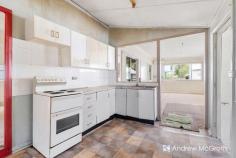  84 Belmont St Swansea NSW 2281 $550,000 Located less than 6 houses from the shores of the Lake, this two-bedroom timber and iron home is in need of a makeover and some TLC! Alternatively, the near level rectangular block is 480sqm in size and has a frontage of 12.2m and a depth of 39.4m. with plenty of room for a granny flat or swimming pool (subject to council approval). The current home accommodates a large combined kitchen dining area that leads to the rear-covered outdoor entertaining area, and a separate living space. Two good size bedrooms, combined bathroom and laundry. Ideal for those of you looking for a project and a future weekender with the fish co op and boat ramp less than 350 metres from your front door, while the Channel is under 650 metres and the Shops 700 metres - everything is nearby. 