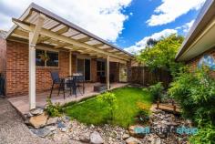  Unit 5/8 Unaipon Ave Ngunnawal ACT 2913 $645,000 This beautifully presented freestanding three bedroom townhouse is located in a small complex of only 6 dwellings across from Ngunnawal Primary School. The property boosts a Japanese inspired private garden with lush greenery surrounding the yard. There is also a spacious paved pergola area, ideal for hosting outdoor gatherings and relaxing in your own private backyard. The floor plan is practical featuring three good size bedrooms all with built in robes, open plan living which flows effortlessly to the outdoor area and a multi purpose room which could be converted back to a garage if required. The hardwood timber flooring and garden views from the living area is a lovely touch and will make you feel right at home. Features -Freestanding townhouse in a small complex of 6 dwellings -Single garage converted to a multi purpose room with storage (can easily be converted back) -Extra open car space next to the garage -Three bedrooms all with built in robes -Well maintained bathroom with separate toilet -Open plan lounge/dining with backyard access -Hardwood timber flooring and new carpet -Well maintained kitchen with pantry and private garden outlook -Private, landscaped garden with spacious paved pergola area -Convenient location, positioned across from Ngunnawal Primary School and walking distance to the Ngunnawal Shops and local parks 