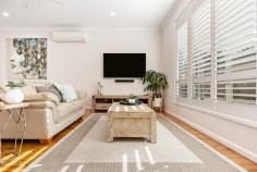  3 Hatfield Street Merewether Heights NSW 2291 Set behind lush greenery for privacy and perched atop its garaging and handy utility rooms, this beautifully renovated, hardwood framed home is designed to embrace a functional family layout with indoor/outdoor flow to a saltwater pool that invites relaxation. Perfect for the active family just 2.5km down to the beach action and 500m from Glenrock State Conservation Area's bike trails, rainforest walks and waterfalls. Stylish interiors have retained the home's gorgeous original timber floors and paired them with crisp décor and plantation shutters to channel a cool, coastal aesthetic. The spacious Caesarstone kitchen flows on from the air-conditioned lounge and dining area and caters perfectly for a growing family with its abundance of bench and cupboard space, quality appliances, and breakfast bar. Enjoy your morning coffee or sundowner in the delightful sunroom or entertain guests under the covered alfresco as the kids splash around in the pool. A three bedroom, two bathroom sleeping wing enjoys privacy away from the social spaces of the home. Teens will have their eye on the lower level, which features two separate rooms and a third bathroom offering a great breakout space for gaming, study or catching up with their friends. Two separate driveways, a carport and single garage has everyone's parking needs covered. This impeccably appointed home is also just 400m from Merewether Heights Public School and Imagine Early Learning Childcare Centre. Enjoy a fantastic lifestyle where you can be shopping up a storm, enjoying a range of cuisines or catching up for a drink with friends at either Westfield Kotara or The Junction in under five minutes. - Dual level weatherboard and tile home on 588.1sqm block with two driveways - Split system a/c to lounge and main bedroom, ceiling fans throughout upper level - Caesarstone Vista kitchen with 900mm induction cooktop, wall oven, dishwasher, plumbing for fridge, plus handy storage cupboard for keys, phones, wallets etc - Sunroom opens to covered alfresco entertaining area and saltwater pool - All three bedrooms fitted with built-in robes, fans and plantation shutters, external roller shutters to master - Just completed renovation of the master ensuite and full size main bathroom, frameless glass showers, back-to-wall toilets, full-height tiling, bathtub in main - Versatile lower level utility rooms, third bathroom, laundry and internal access to garage - 10 minute drive into Newcastle city centre and harbour 