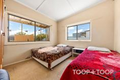  4 Auburn Cres Croydon Park SA 5008 $629,000 - $679,000 Stretching over a 735sqm allotment, this appealing sandstone clad mid-century property offers a family friendly floorplan with a huge backyard, in a convenient location. Well located on a quiet street, this exciting offering will appeal to a wide range of prospective purchasers including those looking for a lifestyle only a block of these proportions can offer, first home buyers, savvy investors, young families, and those wanting to be within close proximity of the city and the sea. This vintage abode built in c. 1954, has the potential to be renovated. detonated or developed (Subject to Planning Consent). Alternatively make the wise choice to extend and transform this art deco delight into one big beauty on this massive allotment. Properties like this offering such grand proportions don't come around very often. Consisting of three spacious bedrooms serviced by a bathroom and separate toilet, fully equipped kitchen including gas cooking, laundry and formal dining and lounge room, there’ll be space for any member of the family. With possibility written all over it, this backyard will excite your creative side. Prime for further upgrades and extension, this could-be family home offers endless potential to improve and create your ideal haven. Offering a fully fenced yard, both pets and children will be able to enjoy growing up free range. Located in Croydon Park, the location affords an easy commute to the heart of the CBD and North Adelaide. In very close proximity, find the joys of Croydon's famous Queen Street, public transport, and a plethora of local shopping precincts. The local area features immediate access to a host of educational facilities. Kilkenny Primary, Challa Gardens Primary and St Margaret Mary's Catholic School are within easy walking or cycling distance. TAFE SA Regency Campus is nearby, while Adelaide and Torrens Universities can be accessed in minutes by public transport. Simply put, an amazing, once-in-a-lifetime opportunity to secure a great property in an area that is only set to soar. Properties of this nature rarely come available, so be quick! Features to note: • Ornate ceilings • Original floorboards under carpet to entrance • Ducted reverse cycle air conditioning • Electric heater to living room • Gas cooking • Skylight to kitchen • Built in cabinets to laundry • Separate toilet off laundry • Combined shower and bathtub to bathroom • Huge rear yard • Massive rainwater tank • Storage shed • Panel lift door for secure garage parking • Roller door access from garage to rear yard • Tenanted until 11/7/23 @ $380 per week. 