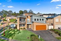  4 Hermitage Place Dapto NSW 2530 $1,250,000 This stunning family home of exceptional dimensions, exudes style and tranquility, overlooking farmland and the escarpment that is uniquely positioned on a 641m2 corner block. Every mans dream will become reality with a 4 car garage (ideal for the tradie or home business), loads of storage area under the house and double gates down the side of the home making it perfect for parking your van or boat. Inside is classy and contemporary with a true entertainers kitchen including all the luxury fittings like 40mm stone benches, 900mm oven and 5 burner gas cooktop. Multiple light filled formal and informal living rooms both up and downstairs, 4 great sized bedrooms, big showers in both the main bathroom and ensuite and with 4 toilets throughout the home. Peacefully set in a quiet cul-de-sac street you will feel a million miles a way with its sensational views of the escarpment and local farmland. HIGHLIGHTS • 4 car garage plus heaps of storage under the home • Side access perfect for parking caravans, boats or trailers • Breath taking views of the escarpment and farmland • Architecturally designed with 9ft ceilings • Multiple living areas • Ducted air-conditioning • Gorgeous kitchen with 40mm stone benchtops, glass splash back, 5 gas burner cooktop and 900mm oven • 2 bathrooms and 4 toilets • Huge alfresco dining with natural gas connection • 6.6kw Solar panels • 641m2 corner block at the end of a cul-de-sac 