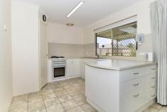  56 St Andrews Loop Cooloongup WA 6168 $369,000 This well-located home has been enjoyed by the current family for the past 27 years. You'll love the beautiful street appeal, multiple living areas, new kitchen, and much-loved backyard, complete with a spacious outdoor living area, large shed, and fenced-off veggie patch (Peter Rabbit's Garden). Ideally located in the popular Woodbridge Golf Course Estate, you are only a hop skip and a jump to the golf course, Don Cuthbertson Reserve, general hospital, train station, shopping complex, and only a short drive to Murdoch University's Rockingham Campus, TAFE, Kwinana Freeway, and Rockingham's stunning foreshore and our many family-friendly beaches. Ideally suited to the young family, retiree, savvy first home buyer, astute investor, or lock-and-leave FIFO/Navy personnel. - Reverse cycle air-conditioning to living and master bedroom - Two separate internal living areas plus spacious outdoor living - New kitchen built in 2021, with double fridge recess, soft close drawers and doors, and extra storage - King-sized master bedroom, with walk-in robe, air-conditioning, ceiling fan, and semi-ensuite  - Good-sized minor bedrooms, one with a built-in robe - Semi-ensuite bathroom with separate shower and bath - Large patio with additional shade-cloth-covered gabled pergola - Automatic bore reticulation to lawns, gardens, and veggie patch - Energy efficient instant gas hot water system, ideal for lock and leave - Secure carport with auto sectional door and room to park a trailer at the rear 