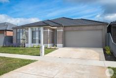  9 Cavan Grove Alfredton VIC 3350 $589,900 - $599,900 This quality built macneil home overlooks natural reserve and is situated opposite the new Coles Shopping Centre, walking distance to the Ballymanus playground, and is close to local schools and sporting facilities. The attractive home offers formal entrance with vinyl planks leading to the generous open living area, with fully equipped kitchen with stainless steel appliances, gas hot plates, fan forced oven, dishwasher, pantry, and stone bench tops The bright meals area joins the spacious family room both with northerly aspect and overlooking the paved entertaining area, the separate front lounge room overlooks the natural parklands. Three large bedrooms, master with full ensuite and walk in robe, tiled main bathroom with free standing bath, laundry, gas central heating, evaporative cooling, large double garage with remote panel lift door and direct house access, established gardens and water tank. 