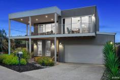  30 Potters Hill Rd San Remo VIC 3925 Surrounded by other quality homes, this property exudes opulence and style. Located in the popular seaside town of San Remo, this home is filled with an abundance of features – suitable for the whole family. On the ground floor of the home, you will find 3 carpeted bedrooms all with built-ins, a well equipped internal laundry, large lounge room perfect for the teenagers and a family bathroom with a luxurious free-standing bath and modern finishes throughout. Natural light fills the upstairs space, which showcases views of Western Port Bay. The chefs kitchen features 40mm caesar stone water fall bench tops, 900mm gas stovetop with stainless steel range hood, large fridge space and storage galore. The open plan kitchen/dining room is perfect for entertaining and the undercover deck invites indoor/outdoor living. The master bedroom offers a large walk-in-robe, ensuite and separate toilet for convenience. There is a multi-purpose room just off the kitchen which could be utilised as a gym or home office. What we like: *4 bedrooms – all carpeted *2 Bathrooms – modern designed *675sqm of low maintenance land *Light filled open plan living *Water views *Walking distance to Bass Coast College – San Remo Campus (600m walk) *Close to all amenities *Modern features throughout *1km walk to Black Beach 