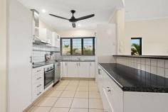  2/7 Fanning Dr Bayview NT 0820 Elegant interiors and contemporary decor define this superbly presented home built with ample room for extended family living. Multiple living areas incorporating impressive design elements plus a low maintenance tranquil garden setting delivers irresistible lifestyle appeal. A sophisticated family haven offering comfortable living in an unbeatable location. Capturing tranquil un-interrupted views over parkland to the peaceful waters of the Bayview Marina., this 4 bedroom town residence is set in a boutique development (1 of 2) and set on a low maintenance 497sqm allotment. This home is truly outstanding in presentation, quality, and design; in a location that is always in strong demand - this is an exceptional opportunity, and inspections will thoroughly impress at every level! Features at a glance: * 4 bedroom townhouse amongst a complex of just 2 * A generous 497sqm of land on title with side access to back yard * Marina and parkland views from the upstairs living area and balcony * Great sized tiled pool offering endless entertainment for the family * Sleek, modern kitchen with breakfast bar and stainless steel appliances * Spacious open plan living upstairs opening out to large balcony * Outdoor patio downstairs with great tropical surrounds * Well-appointed main bathroom and ensuite with granite benchtops * Lovely wooden blinds throughout the bedrooms proving a classy touch * No Body Corporate fees to ever worry about! 3 bedrooms are located on the bottom floor, with the master featuring a walk-in wardrobe, and direct access to the rear patio and pool area. It also boasts a luxurious ensuite with a large shower and granite bench top vanity unit. A 4th bedroom or study is situated on the top floor and the property. The spacious kitchen has been appointed with modern stainless steel appliances, plenty of bench space and streamlined storage options with pull out draws making for easy access. The sparkling blue tiled in-ground pool offers a tranquil place to relax with family or entertain guests, set amongst the beautiful surrounds of foxtail plants and complimented with the waterfall feature. Low maintenance gardens as well as tiled/paved outdoor spaces allow for easy upkeep to the property. A garden shed is neatly located at the back of the block which houses the pool pump, while there is extra storage in the generous sized storeroom. Situated and a quiet family friendly location within walking distance of the CBD, shopping, dining, schools and childcare, walking trails and parkland plus public transport. This great home just a short stroll from the picturesque Bayview Marina and is ideal for the modern growing family. 