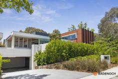 22 Somers Cres Forrest ACT 2603 Positioned in a boutique complex in one of Canberra’s most prestigious locations is this stunning 4 bedroom ensuite townhouse. HOME: The home has been thoughtfully positioned to maximise natural light and a leafy outlook from every room whilst maintaining full privacy. The heart of the home is the central open plan living area which seamlessly connects the sleek kitchen to the secluded outdoor alfresco area, creating multiple inviting spaces to entertain family and friends. Four zone speaker system integrated into ceiling for music throughout. All four bedrooms are spacious in size with the master bedroom situated downstairs showcasing an ensuite, additional walk-in robe and private courtyard. The high design standards set in the internal areas are matched by the quality exterior with a heated plunge pool, generous alfresco area and landscaped gardens. FEATURES: • Natural light cascades throughout the entire home • Neutral tones and timber highlights give the property a welcoming warmth • Blackbutt timber flooring throughout • Master bedroom boasts a walk-in robe, built-in robe, double vanity and private courtyard • 3 bedrooms located to the upper level, creating the ideal parents retreat for the master bedroom located on the ground floor • Built-in robes to all bedrooms • Double glazed windows • Sliding door access to alfresco area with built-in BBQ equipment • Solar heated swimming pool • Sleek fully tiled bathrooms with in slab heating, main bathroom complete with bathtub • Powder room to ground floor, ideal for guest • Modern separate laundry • Dream kitchen showcasing stone bench tops, gas cook top, integrated dishwasher and refrigerator, walk-in pantry, Miele appliances and island bench • Four zone integrated speaker system throughout entertaining areas downstairs • Additional integrated study nook • Ducted reverse cycle air-conditioning downstairs, individually controlled units in bedrooms upstairs • Gas log fire places to the living area and separate formal lounge room • Double internal garage with remote • Landscaped low maintenance gardens LOCATION: The views to Parliament House from the upper level say it all about the location; Somers Crescent is within close proximity Parliamentary Triangle, Canberra's finest dining, entertainment, and shopping precincts, as well as easy access to government offices, Capital Hill, Lake Burley Griffin, Manuka, Fyshwick Markets, Deakin business district and the effervescent Old Kingston and the Foreshore. OPPORTUNITY: Rarely does a home of this considerate design, condition and location become available in such a highly desirable and sought after location. 